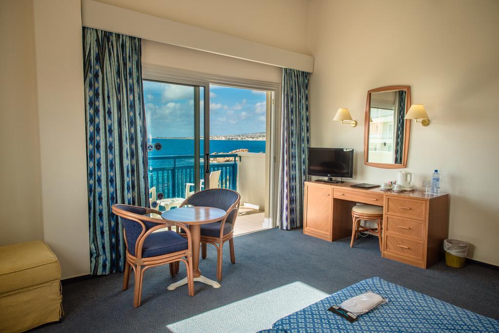 Cynthiana Beach Hotel Кисонерга Стая снимка