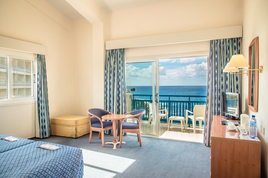 Cynthiana Beach Hotel Кисонерга Стая снимка